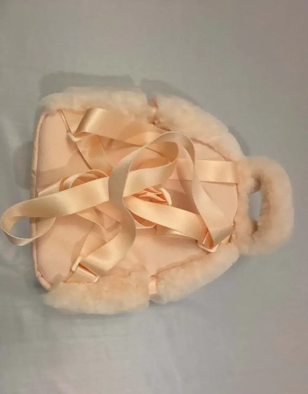 Nike 365 Faux Fur Mini Backpack in Peach/Cream with Black Swoosh